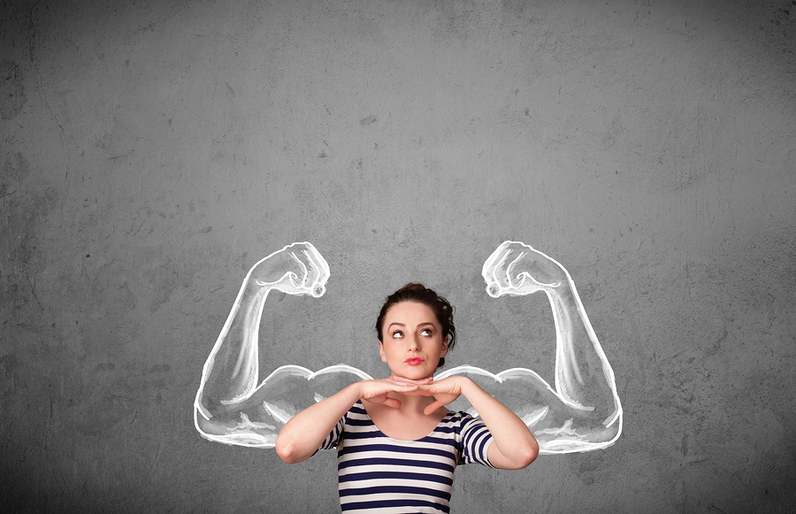 Pretty young woman with sketched strong and muscled arms